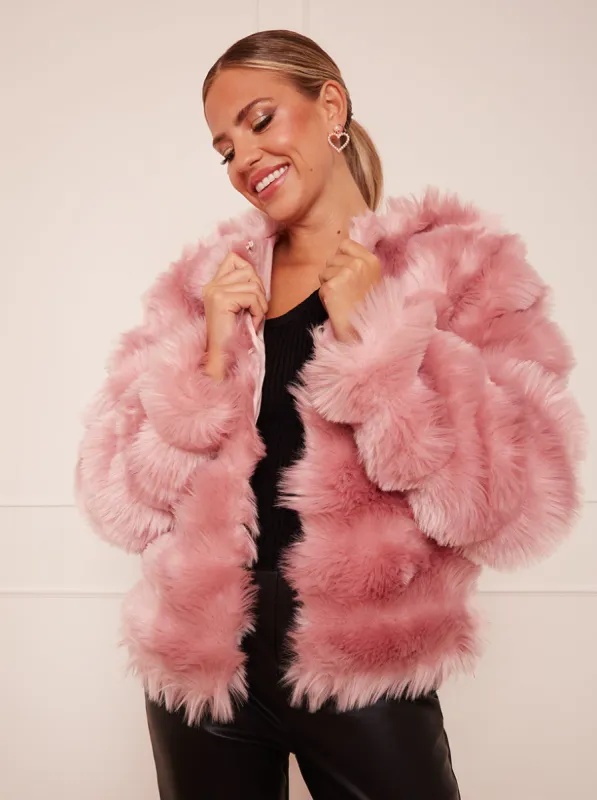 Textured Faux Fur Coat in Pink sold by Chi Chi London