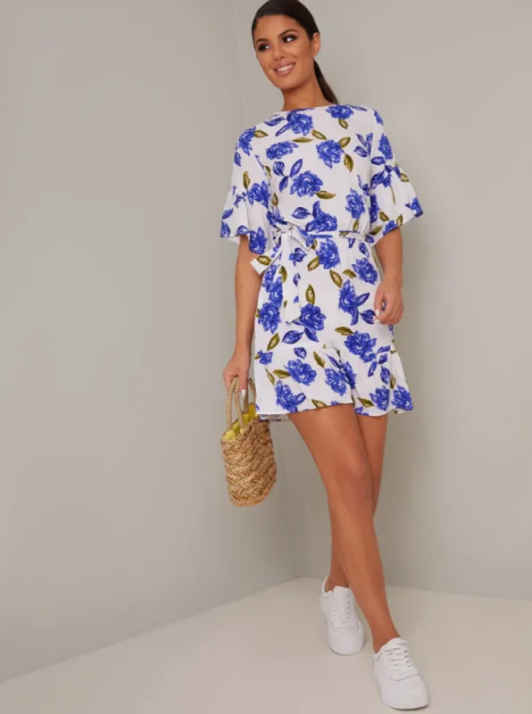 Angel Sleeve Floral Print Mini Dress in Blue sold by Chi Chi London