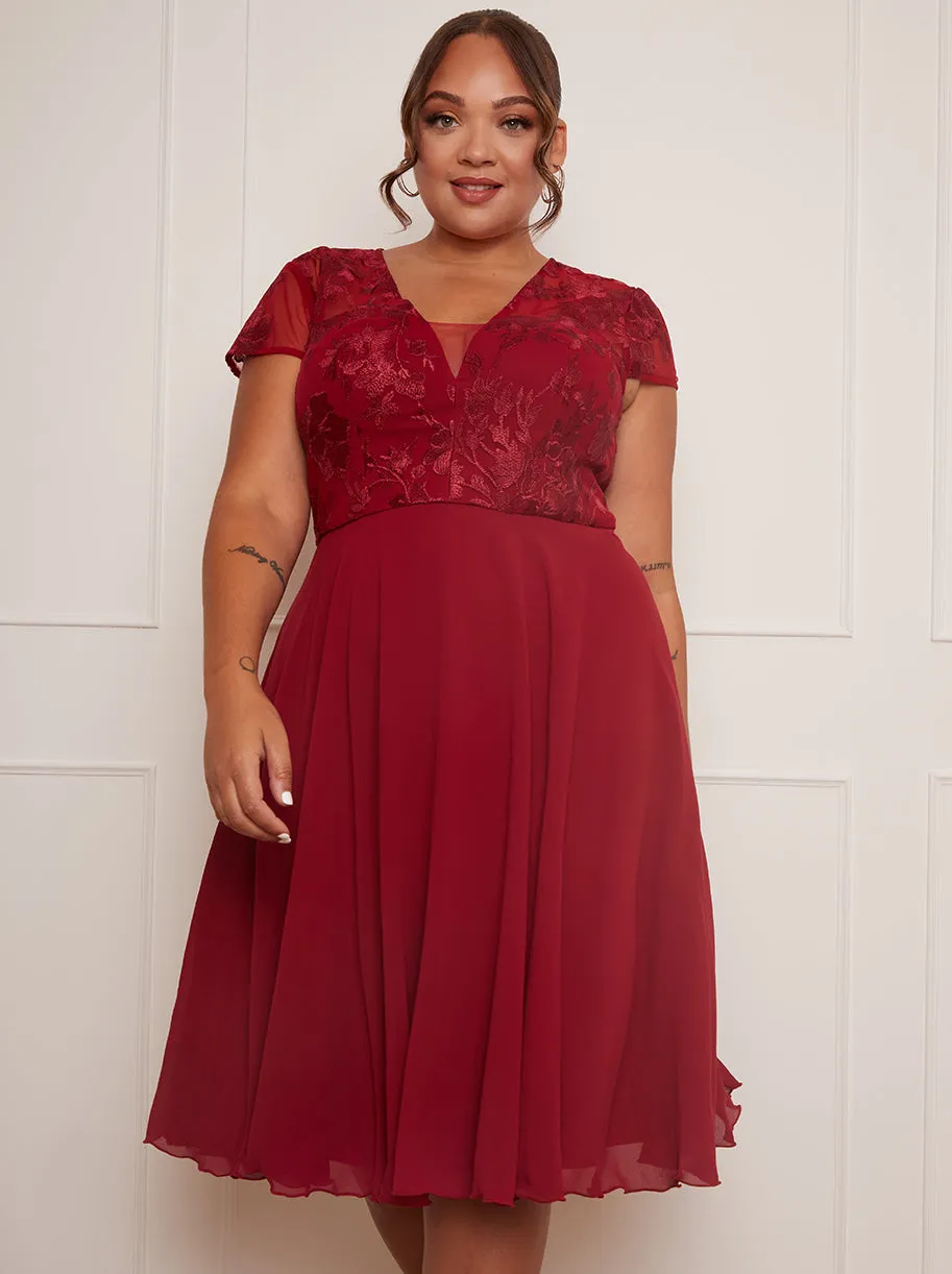 Plus Size V Neck Embroidered Midi Dress in Red sold by Chi Chi London