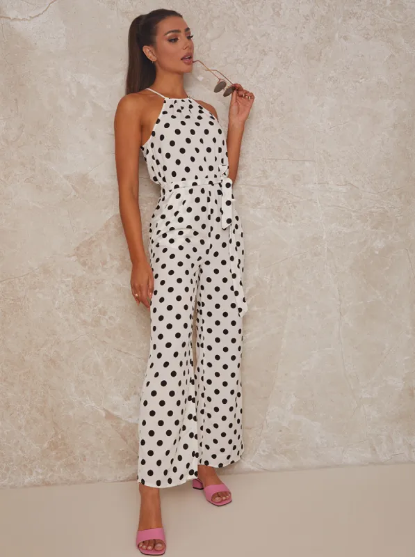 Polka Dot Halterneck Jumpsuit in White sold by Chi Chi London