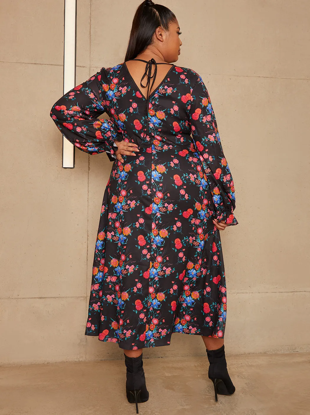Plus Size Long Sleeve Plunge Floral Printed Midi Dress in Black sold by Chi Chi London product image thumbnail 2