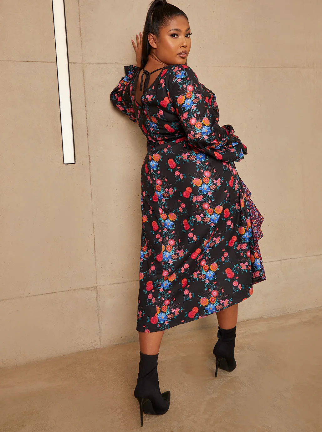 Plus Size Long Sleeve Plunge Floral Printed Midi Dress in Black sold by Chi Chi London product image thumbnail 4