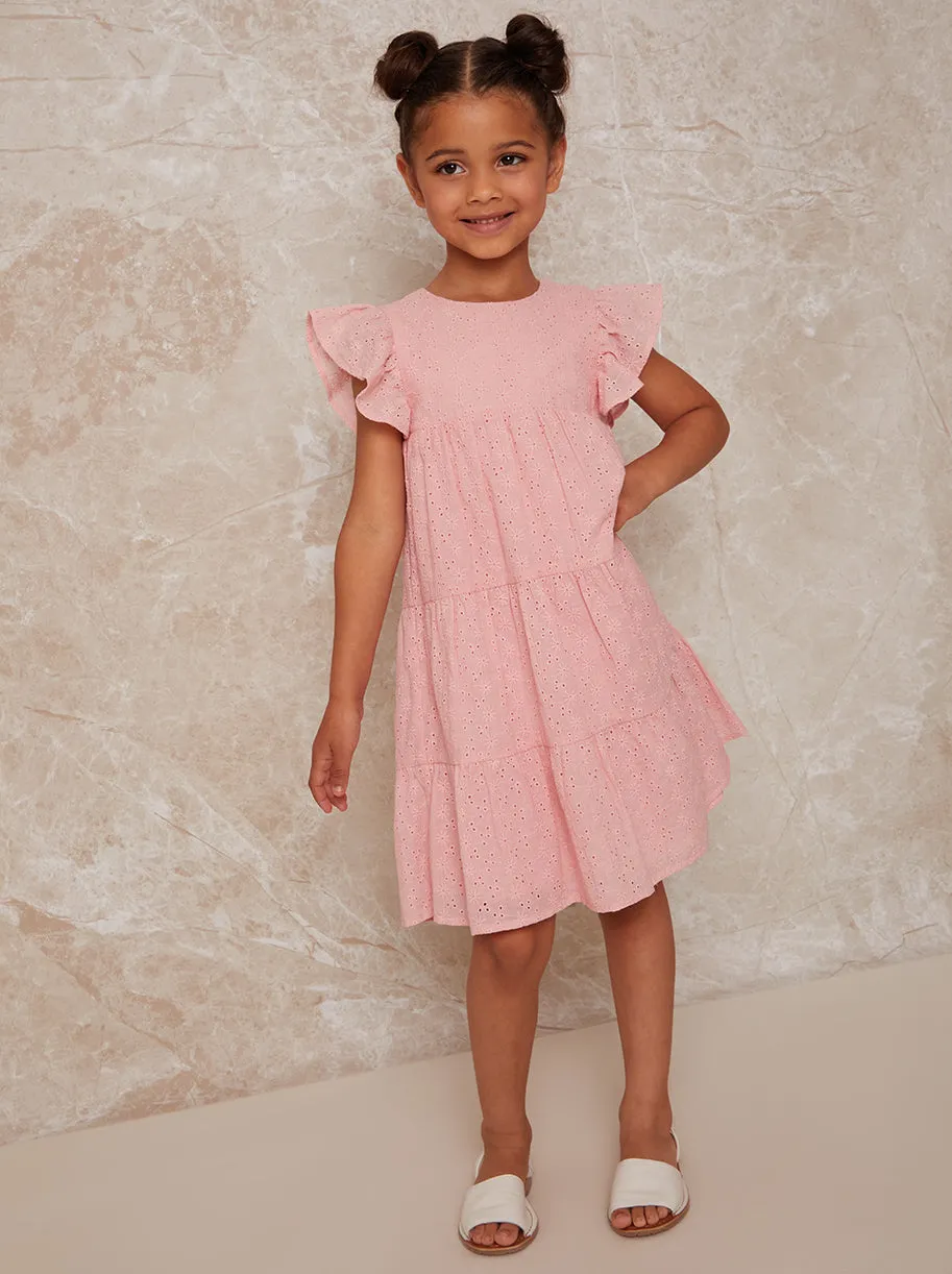 Girls Tiered Broderie Smock Dress in Pink sold by Chi Chi London