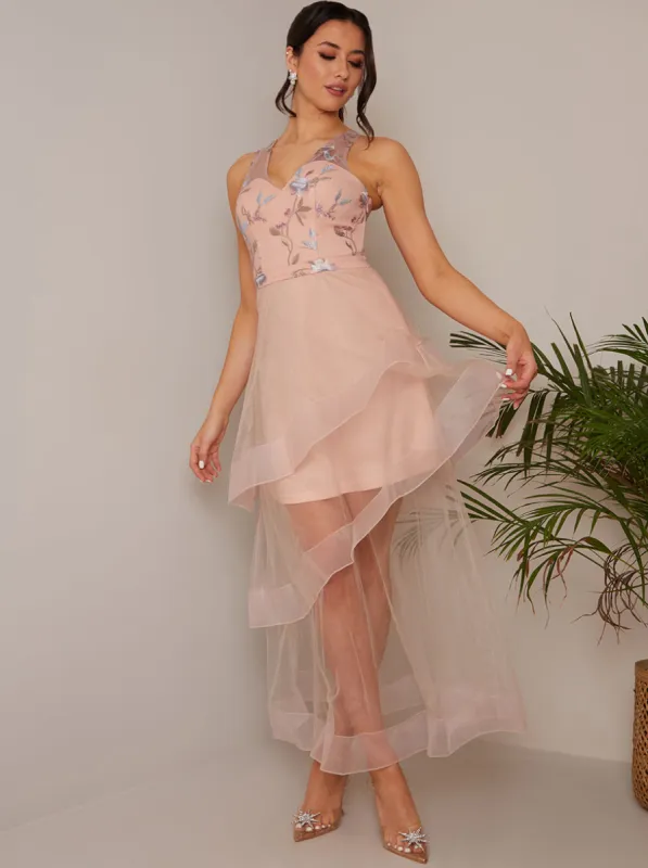 Embroidered Floral Tiered Dip Hem Dress in Pink sold by Chi Chi London