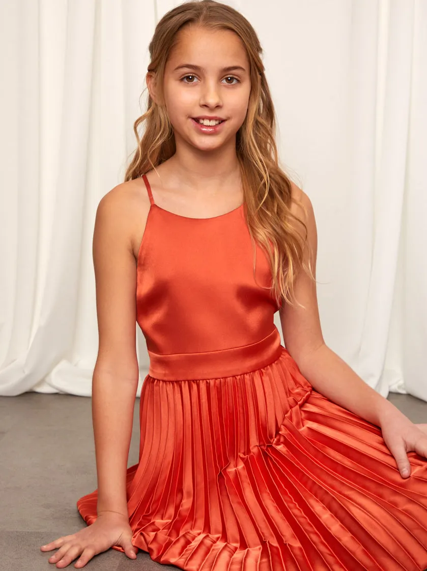 Older Girls Pleated Satin Flower Girl Dress in Rust sold by Chi Chi London