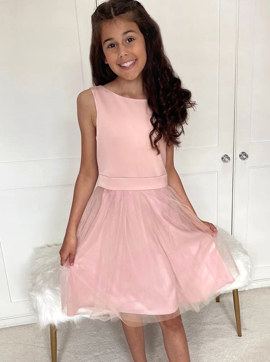 Older Girls Bow Detail Tulle Flower Girl Dress in Pink sold by Chi Chi London