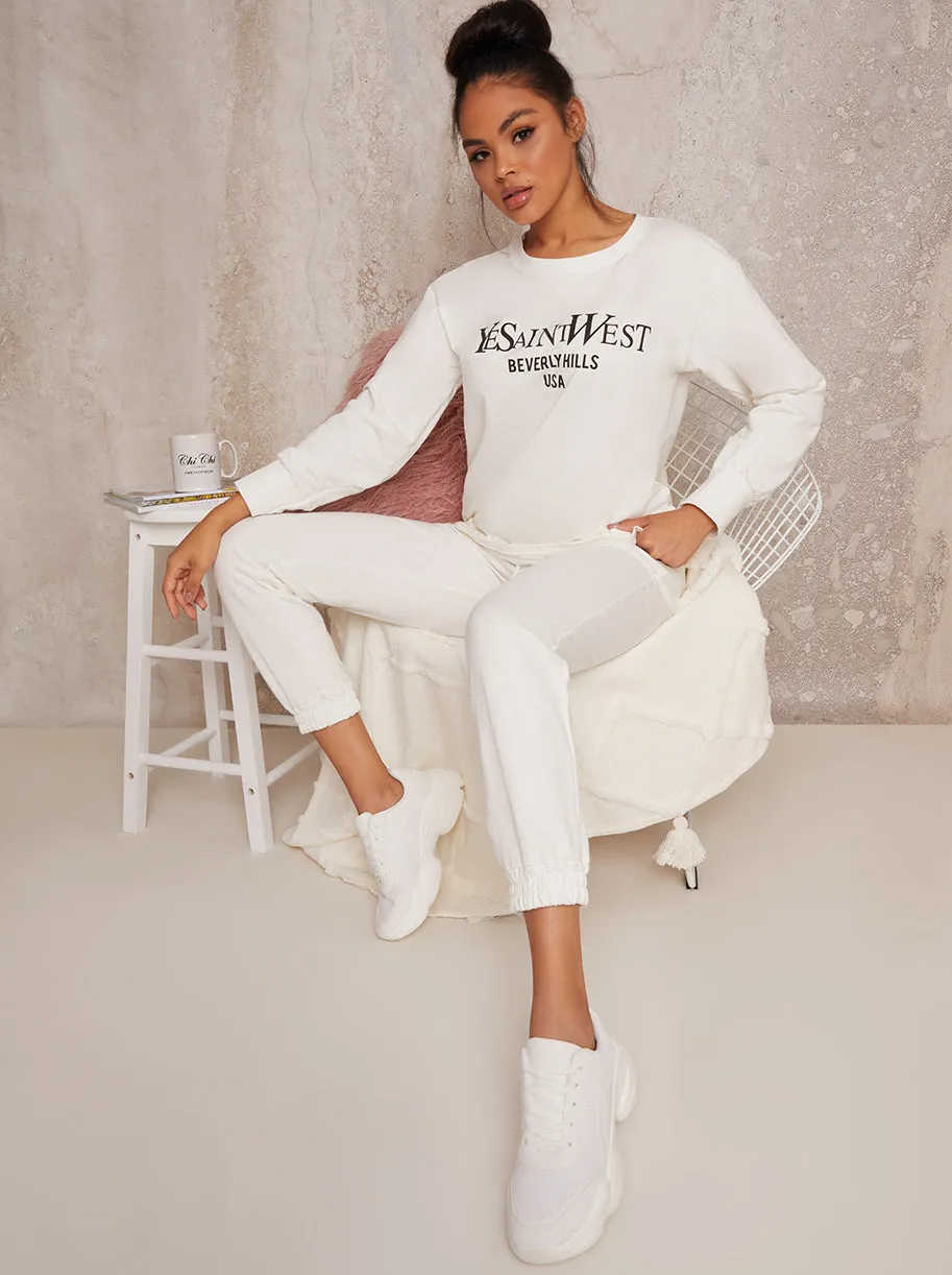 Printed Slogan Lounge Jogger Set in Cream sold by Chi Chi London