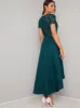 Sheer Lace Dip Hem Midi Dress in Green sold by Chi Chi London