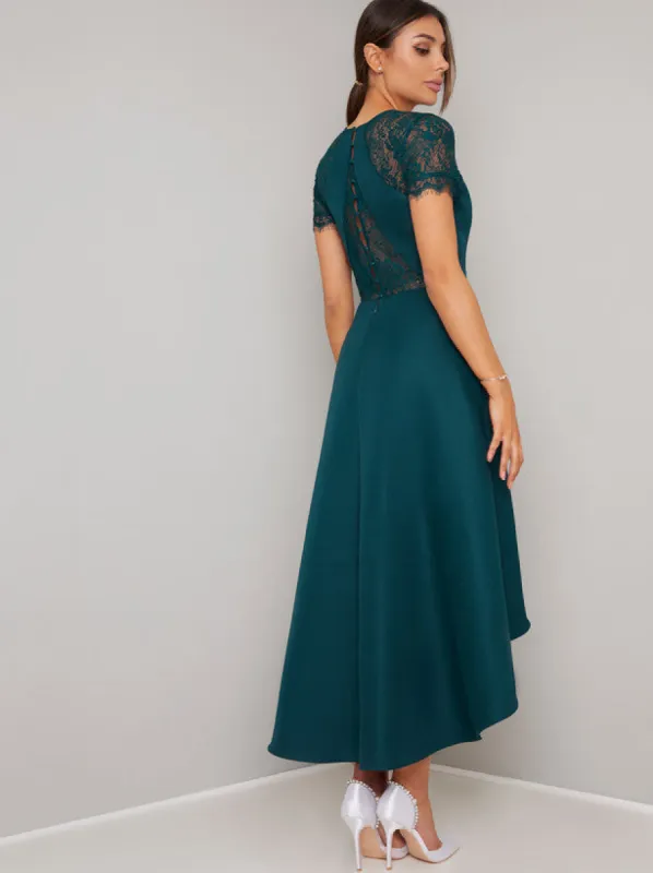 Sheer Lace Dip Hem Midi Dress in Green sold by Chi Chi London