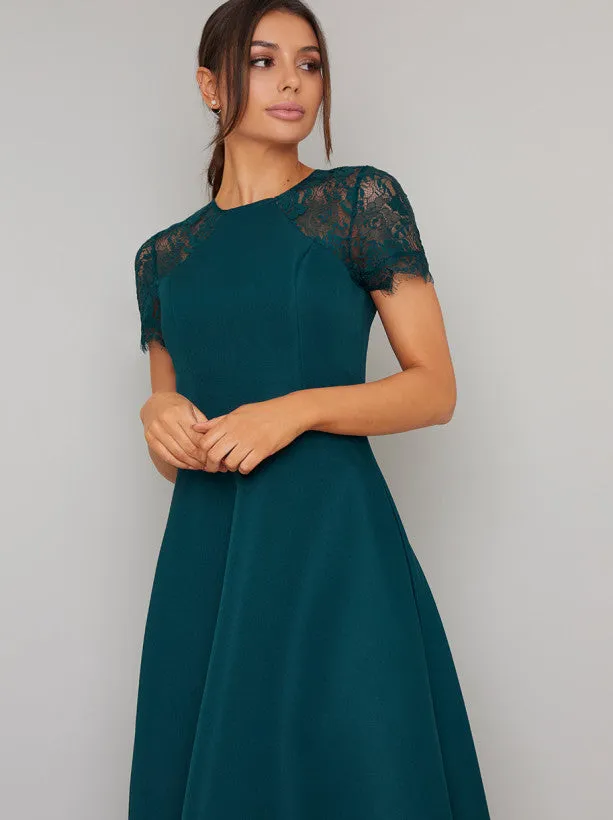 Sheer Lace Dip Hem Midi Dress in Green sold by Chi Chi London product image thumbnail 2