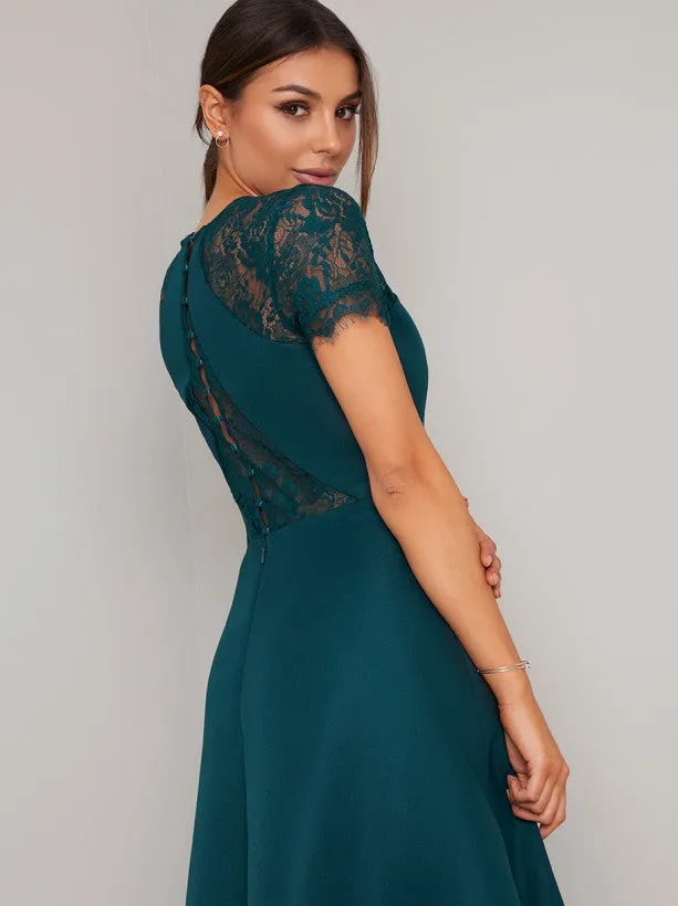 Sheer Lace Dip Hem Midi Dress in Green sold by Chi Chi London product image thumbnail 3