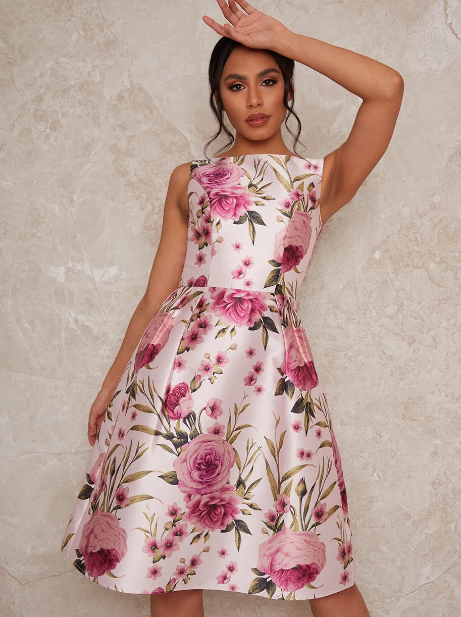 Sleeveless Floral Box Pleated Midi Dress in Pink sold by Chi Chi London