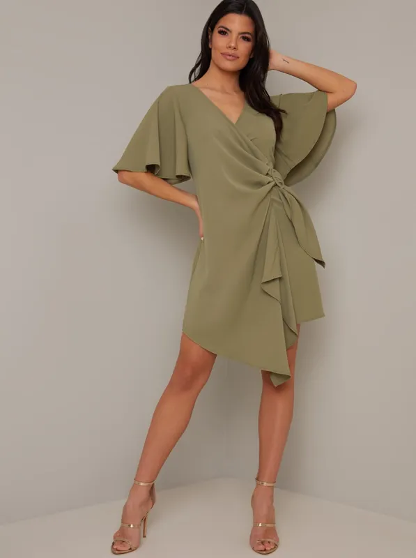 Angel Sleeved Wrap Dress in Green sold by Chi Chi London