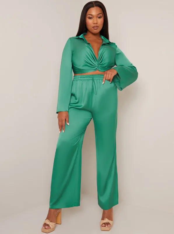 Satin Wide Leg Elasticated Waist Trousers in Green sold by Chi Chi London