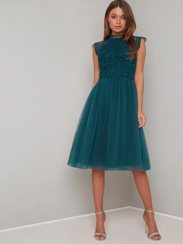 Midi Dress with Floral Crochet Design in Green sold by Chi Chi London