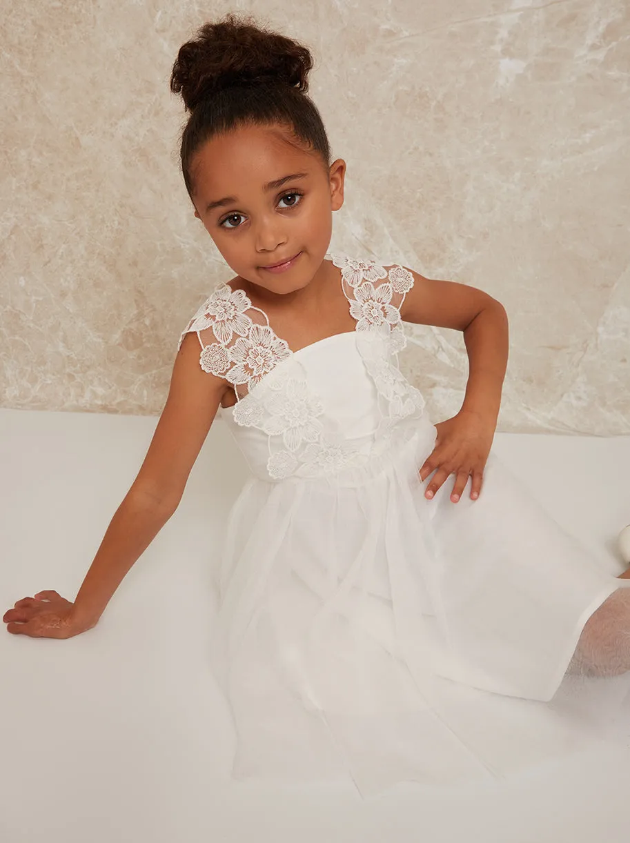 Girls Crochet Trim Dress with Mesh Skirt in White sold by Chi Chi London