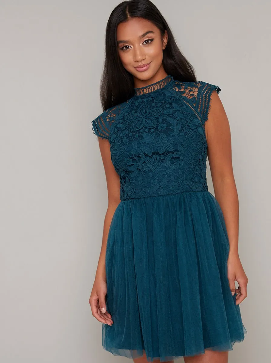 Petite Crochet Lace Tulle Mini Dress in Green sold by Chi Chi London