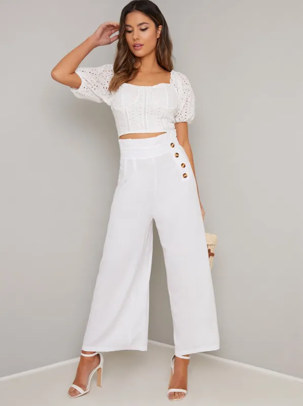 Broderie Angalise Crop Puff Sleeve Top in White sold by Chi Chi London