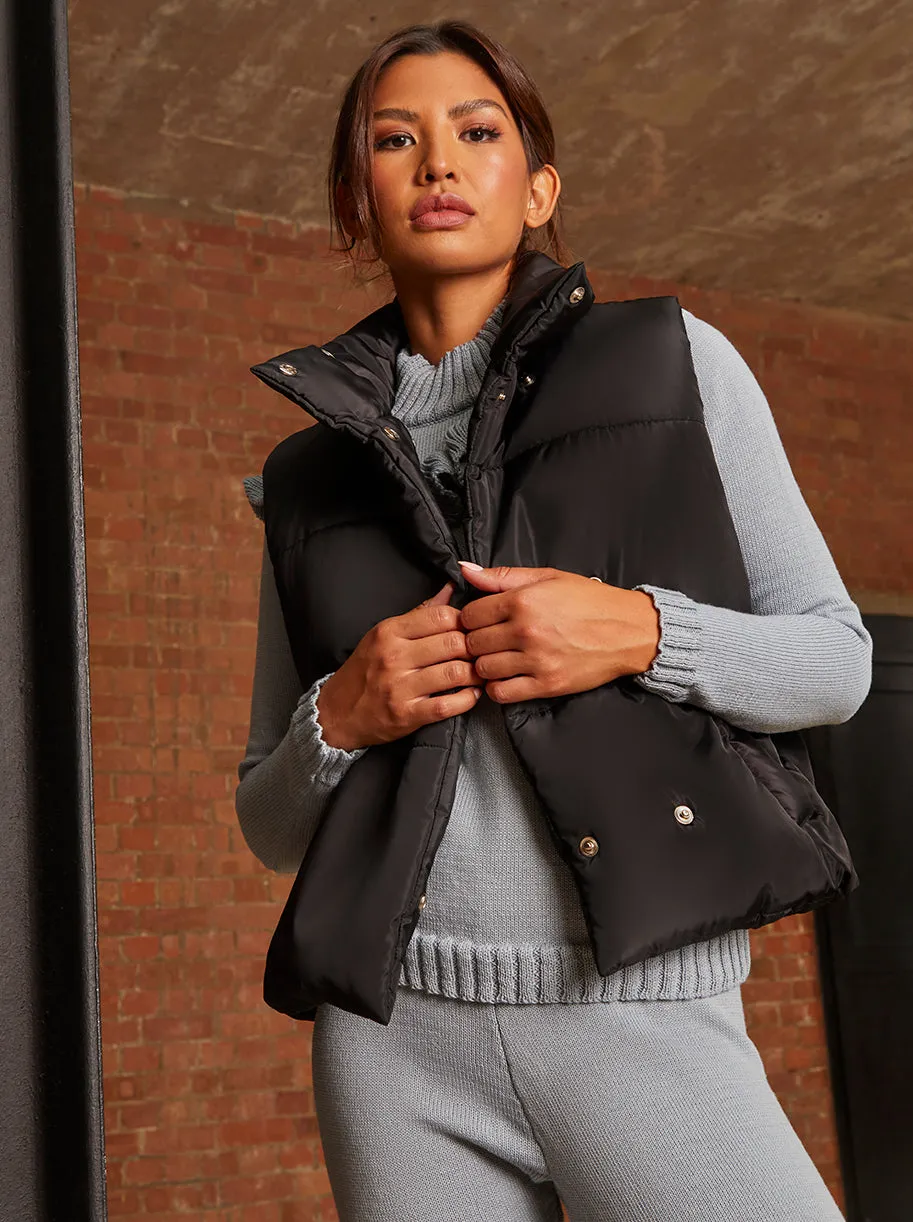 Oversized Duvet Gilet in Black sold by Chi Chi London