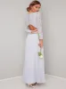 Long Sleeved Lace Pleated Maxi Dress in Blue sold by Chi Chi London