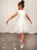 Younger Girls Ruffle Tulle Midi Dress in White sold by Chi Chi London