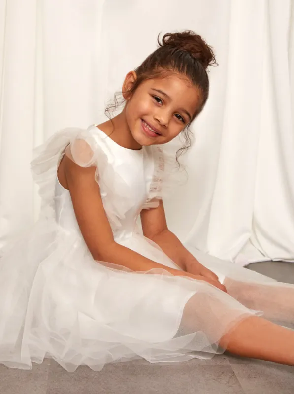 Younger Girls Ruffle Tulle Midi Dress in White sold by Chi Chi London