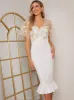 V Neck Embroidered Bodycon Dress in White sold by Chi Chi London