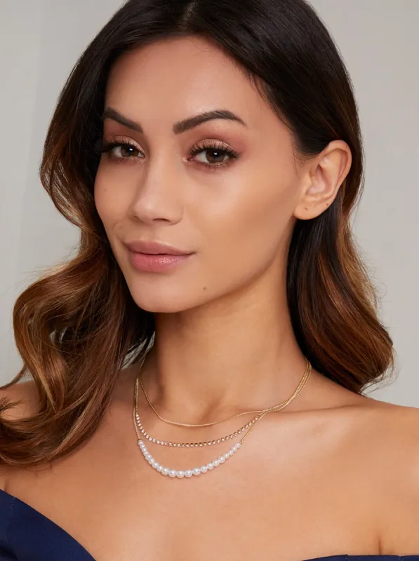Triple Chain Detail Necklace in Gold Finish sold by Chi Chi London
