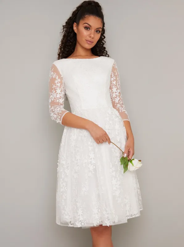 Bridal 3/4 Sleeved Lace Mesh Midi Dress in White sold by Chi Chi London