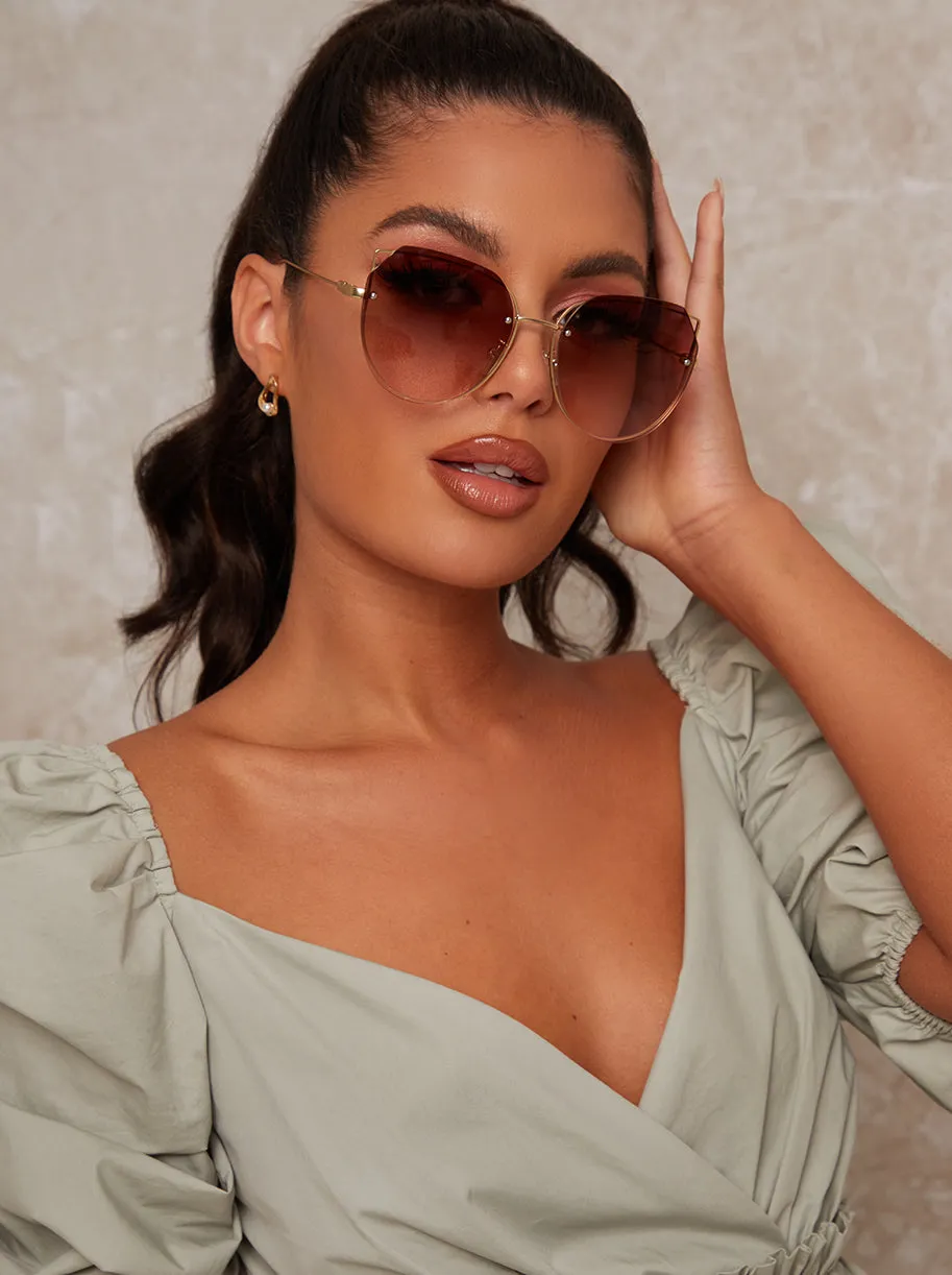Oversized Rounded Cat Eye Sunglasses in Brown sold by Chi Chi London product image thumbnail 2