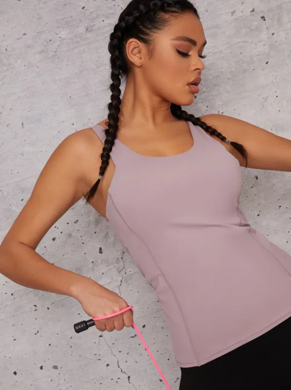 Sleeveless Sports Top with Keyhole Back in Beige sold by Chi Chi London