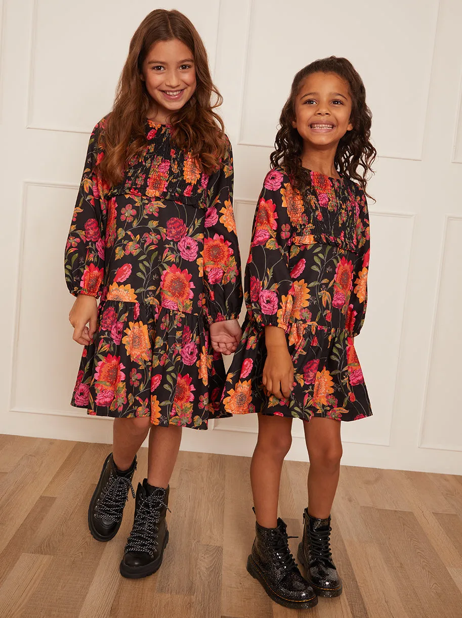 Younger Girls Long Sleeve Floral Smock Dress in Black sold by Chi Chi London
