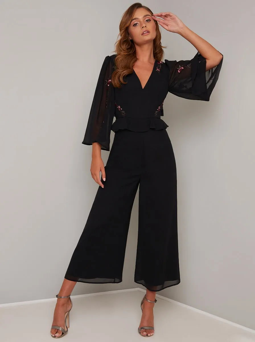 Embroidered Flare Sleeved Crop Jumpsuit in Black sold by Chi Chi London