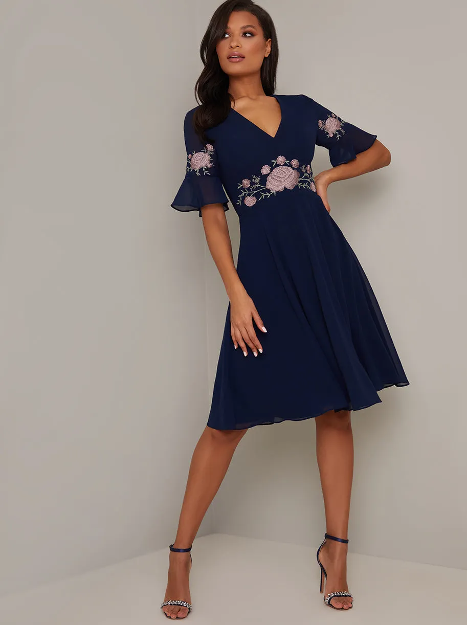Lace V Neck Midi Dress in Blue sold by Chi Chi London