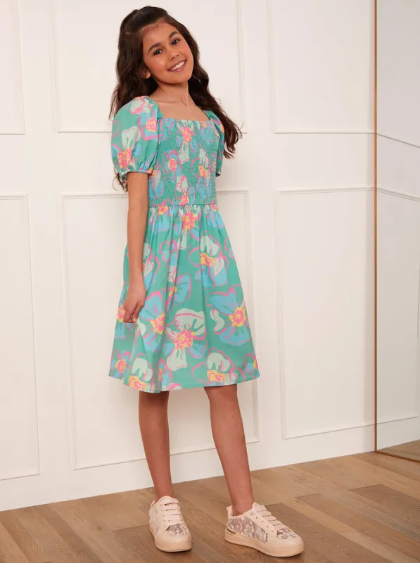 Older Girls Puff Sleeve Shirred Floral Midi Dress in Green sold by Chi Chi London