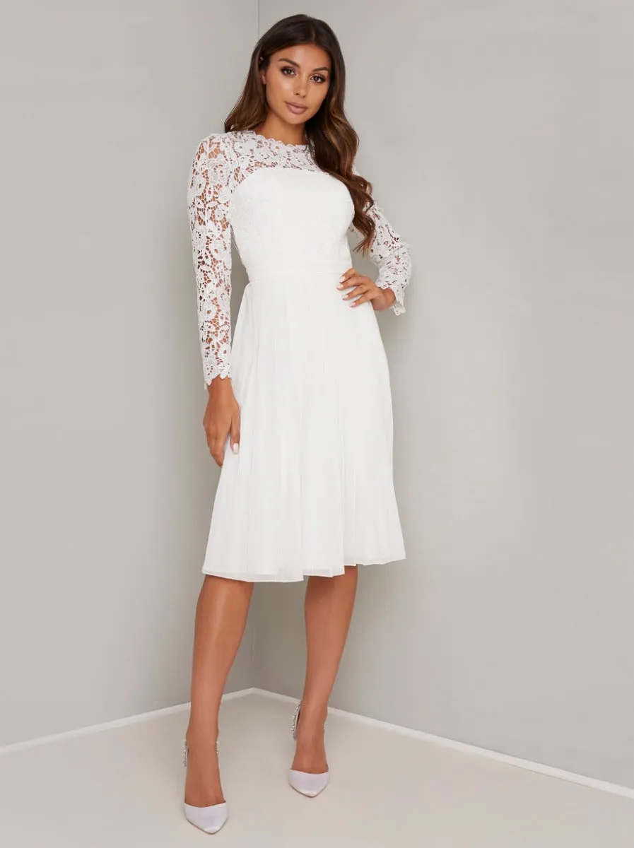 Lace Long Sleeved Midi Dress in White sold by Chi Chi London