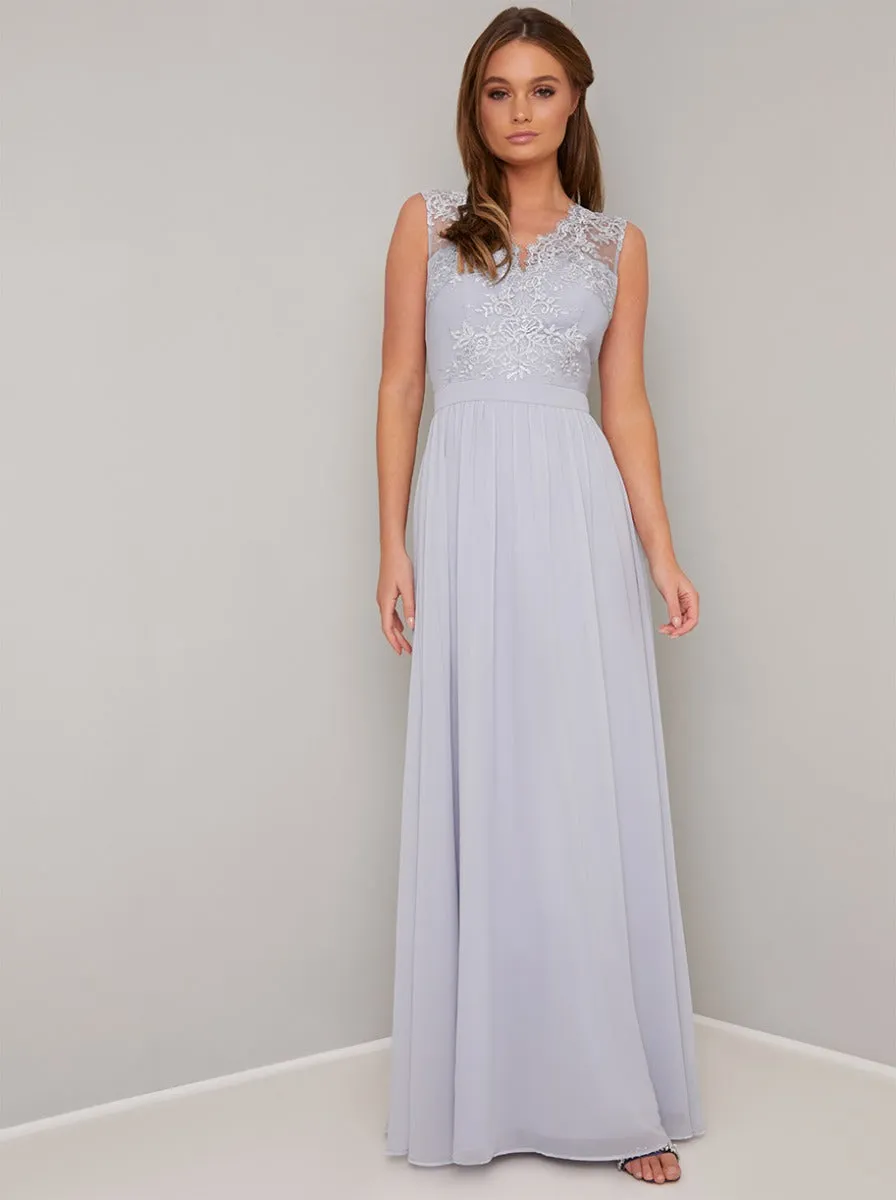 Lace Bodice V Neck Chiffon Maxi Dress in Blue sold by Chi Chi London