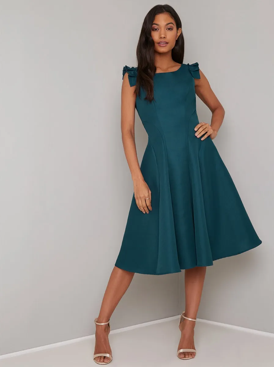 Open Back Ruffle Detail Midi Dress in Green sold by Chi Chi London