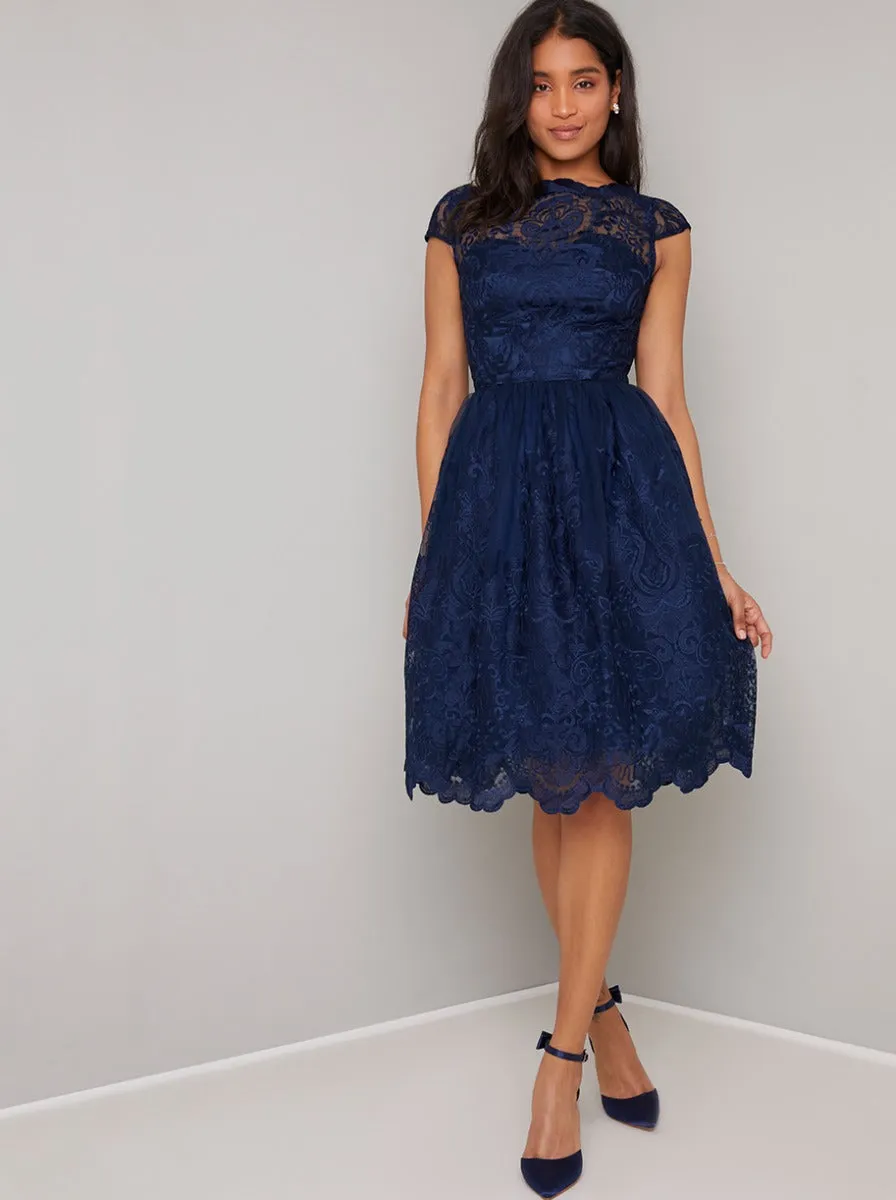 Cap Sleeved Embroidered Lace Midi Tea Dress in Blue sold by Chi Chi London