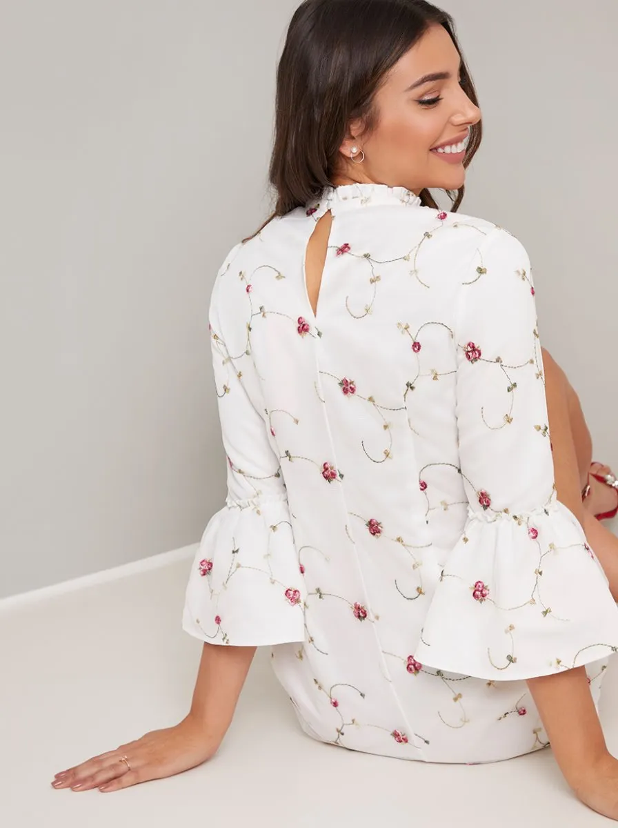 Flute Sleeve Floral Print Mini Dress in White sold by Chi Chi London product image thumbnail 4