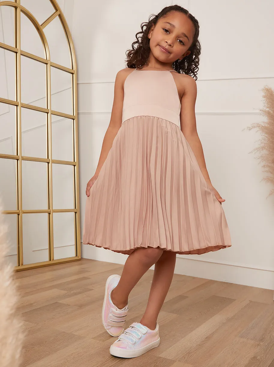 Younger Girls Pleated Satin Flower Girl Dress in Champagne sold by Chi Chi London