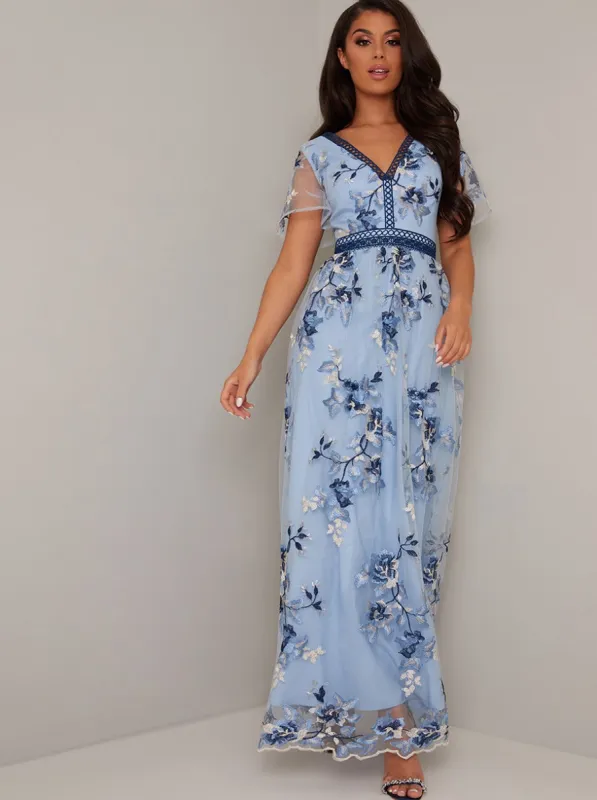 Embroidered Floral Sheer Sleeved Maxi Dress in Blue sold by Chi Chi London