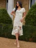 Embroidered Short Sleeve Midi Dress in Yellow sold by Chi Chi London