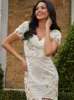 Embroidered Short Sleeve Midi Dress in Yellow sold by Chi Chi London