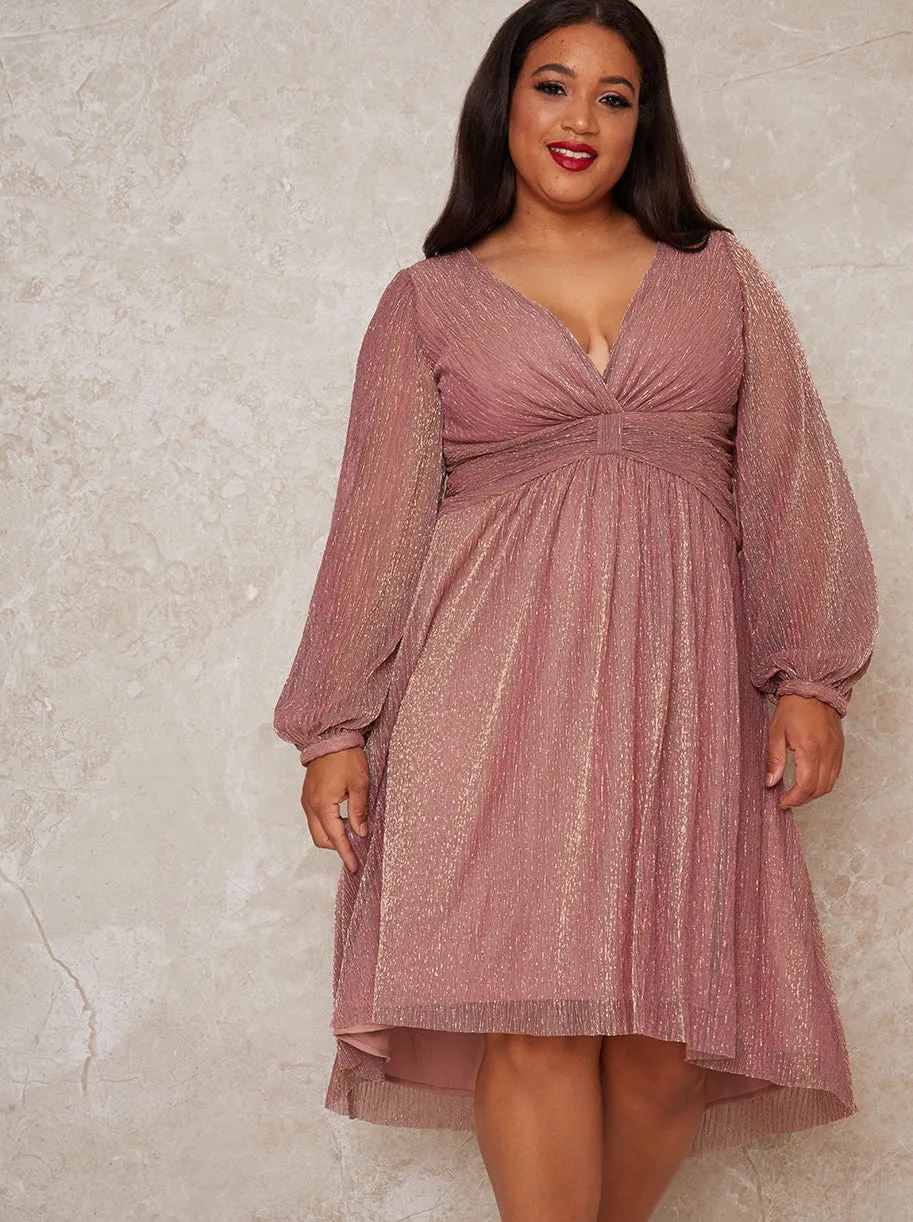 Plus Size Long Sleeve Dip Hem Party Dress in Pink sold by Chi Chi London