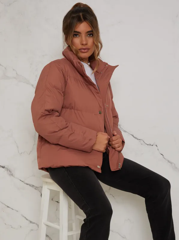 Cropped Padded Puffer Coat in Rust sold by Chi Chi London
