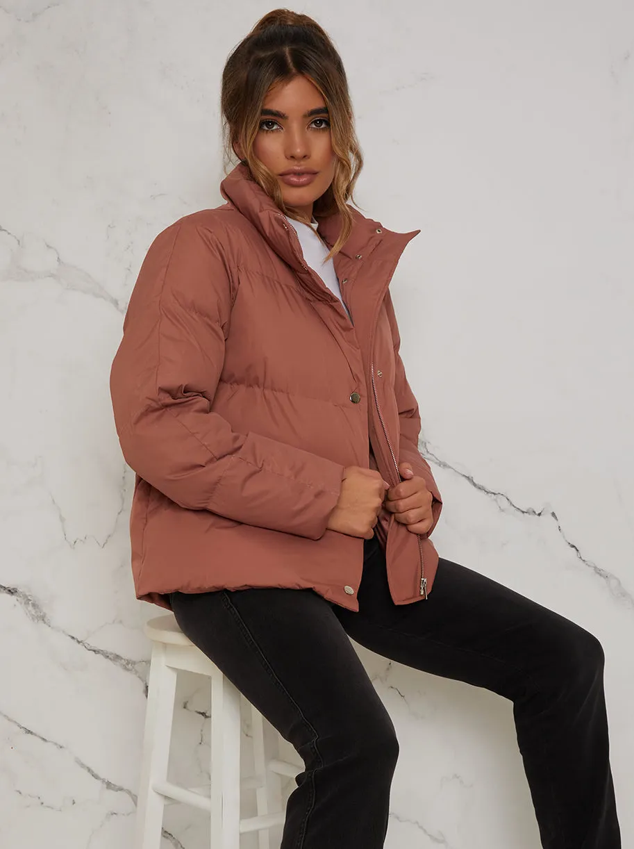 Cropped Padded Puffer Coat in Rust sold by Chi Chi London