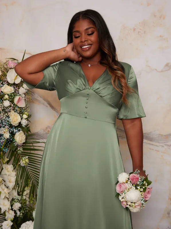 Plus Size Flutter Sleeve V Neck Satin Maxi Dress in Green sold by Chi Chi London
