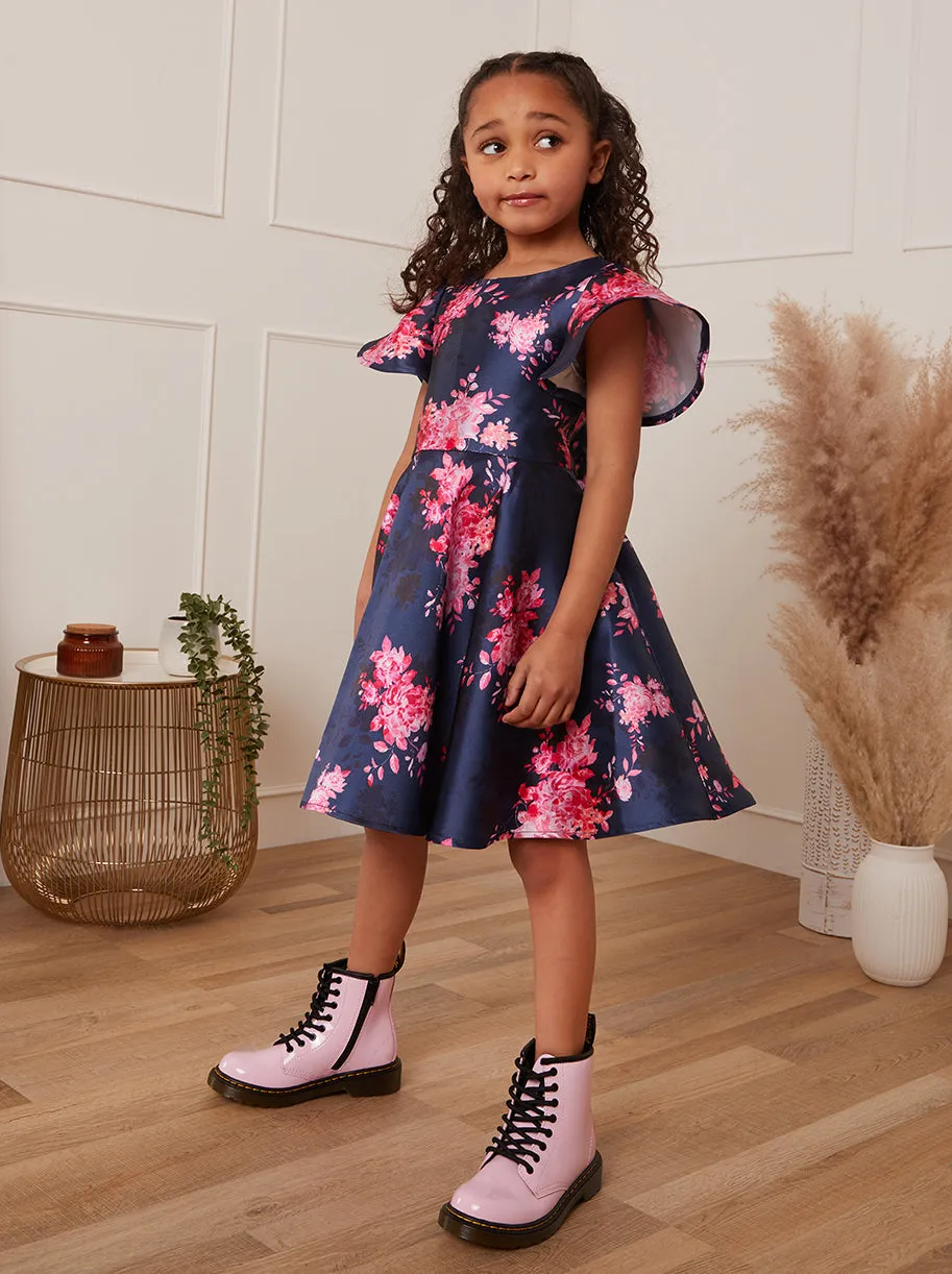 Younger Girls Flutter Sleeve Floral Midi Dress in Navy sold by Chi Chi London