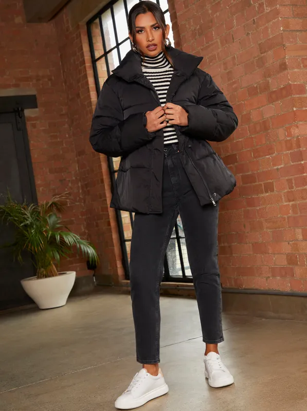 Shirred Waist Short Padded Jacket in Black sold by Chi Chi London